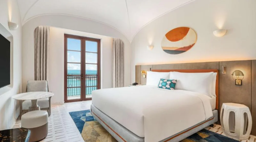 King Balcone Ocean View Room at La Festa Phu Quoc Curio Collection By Hilton