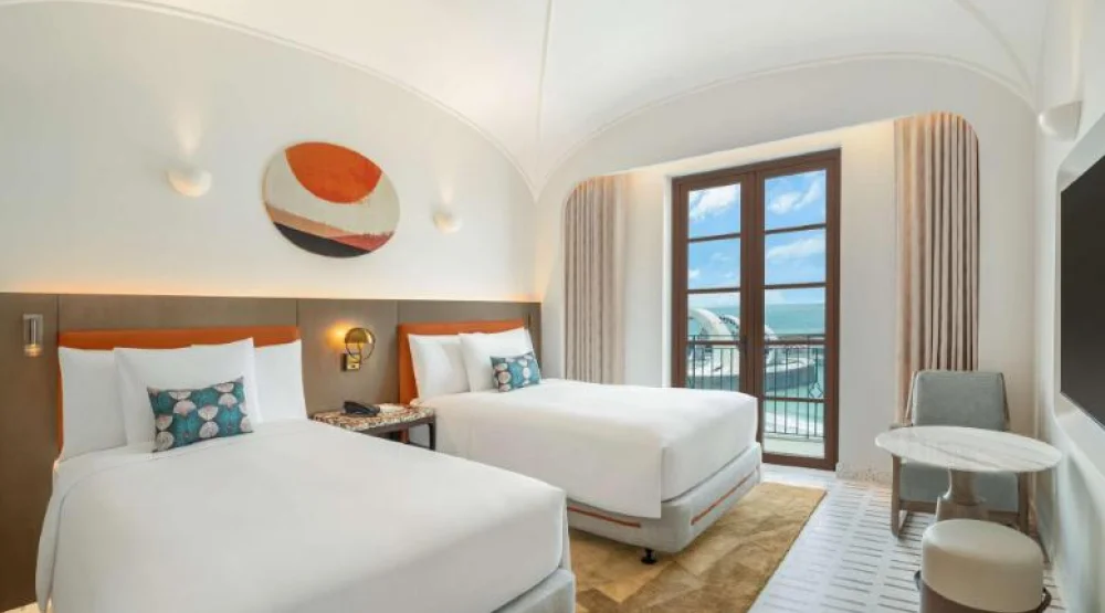 Twin Balcone Ocean View Room at La Festa Phu Quoc Curio Collection By Hilton