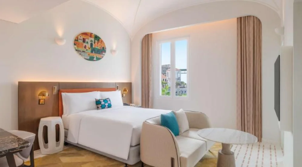 King Deluxe Ocean View Room at La Festa Phu Quoc Curio Collection By Hilton