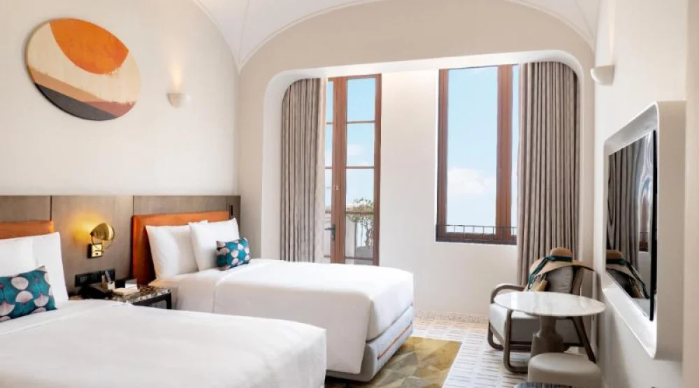 Twin Balcone Room at La Festa Phu Quoc Curio Collection By Hilton