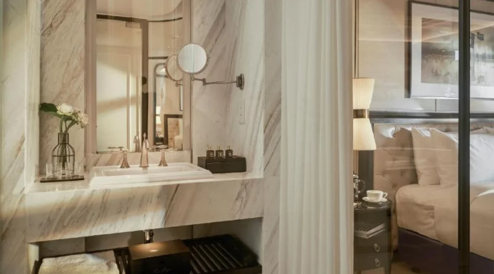 Deluxe King at Mai House Saigon Hotel