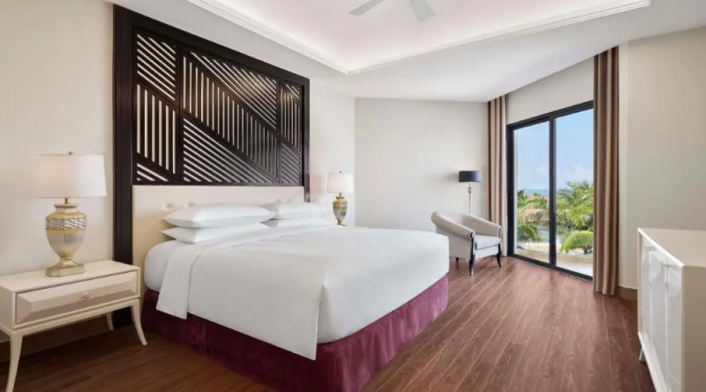 Three Bedroom Presidential Suite, Bedroom 1: One King, Bedroom 2: One King, Bedroom 3: One King, Balcony at Renaissance Danang Hoi An Resort & Spa