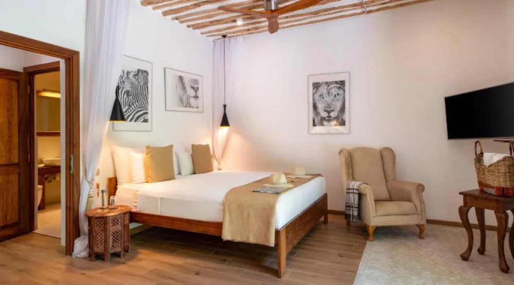 Economy Quadruple Room at Zanzibar White Sand Luxury Villas & Spa