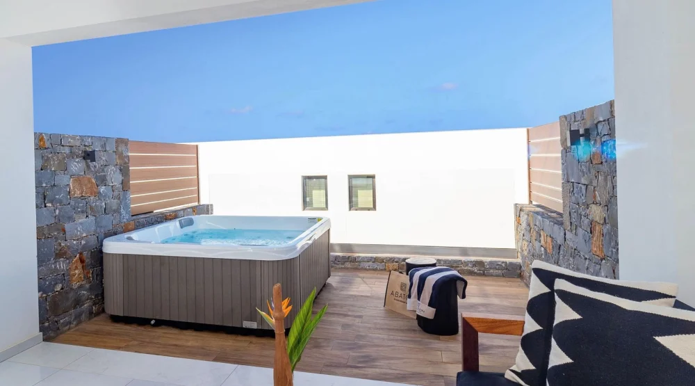 Luxury Guestroom with Private Outdoor Jacuzzi at Abaton Island Resort & Spa