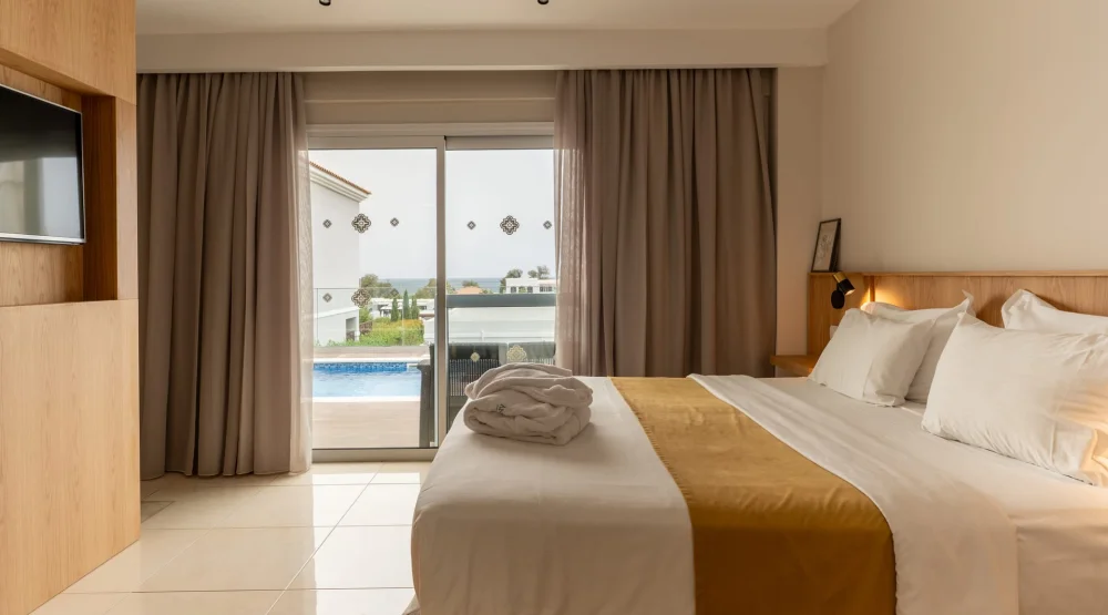 Grand Family Suite Two Bedrooms Sharing Pool at Anemos Luxury Grand Resort