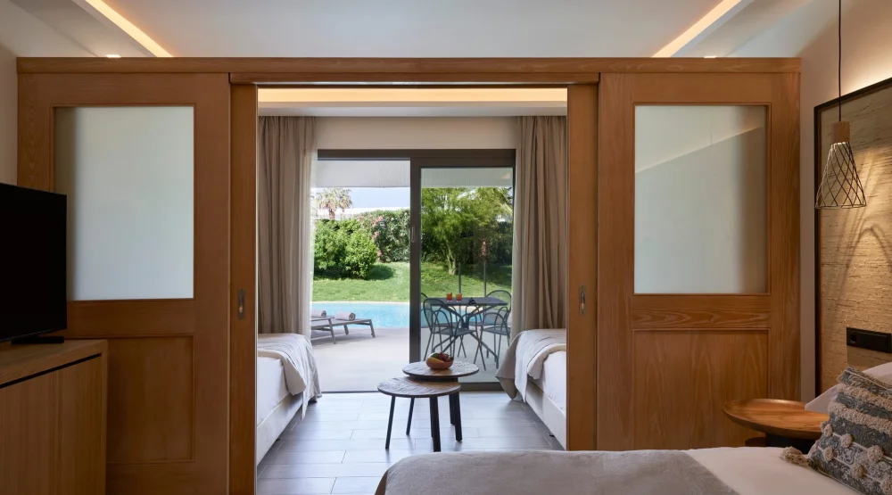 Premium Family Room Sliding Door Swim Up Inland View at Atlantica Aegean Blue