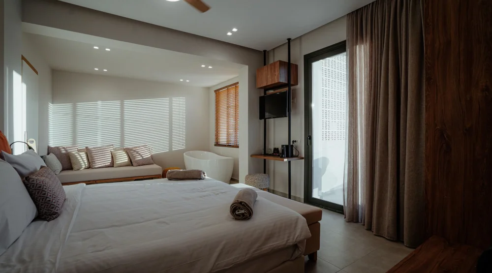 Junior Suite with Side Sea View at Enorme Teatro Beach Resort