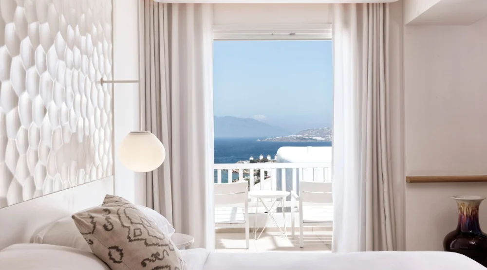 Artemis Deluxe Double Room with Side Sea View at Myconian Kyma Design Hotel