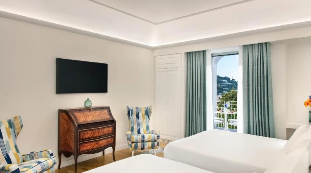 Quadruple Prestige Room with Garden View at Pazziella Garden & Suites