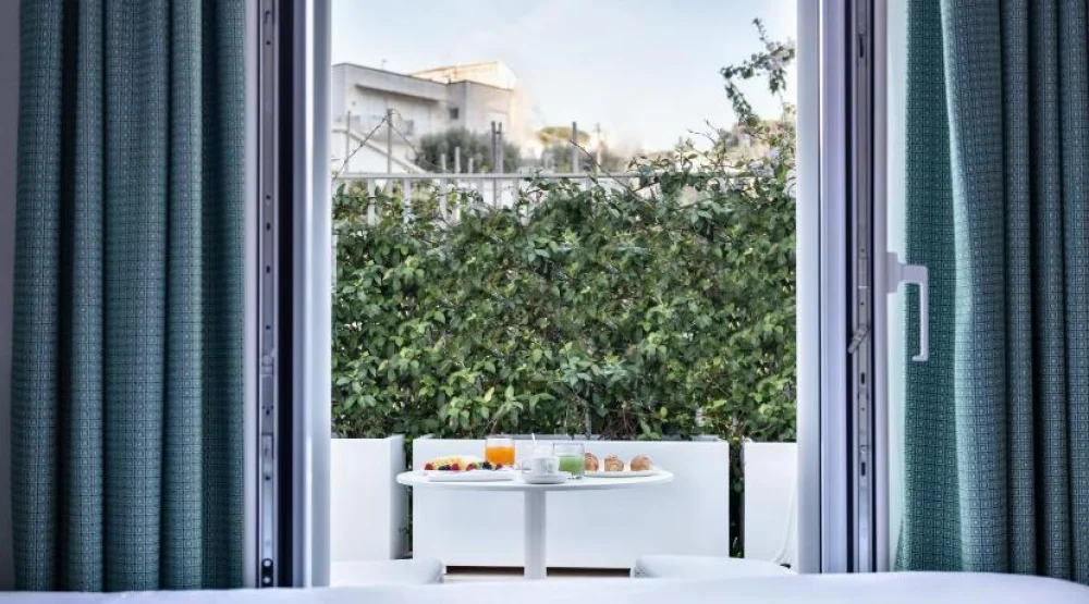 Whirlpool Suite with Patio at Pazziella Garden & Suites