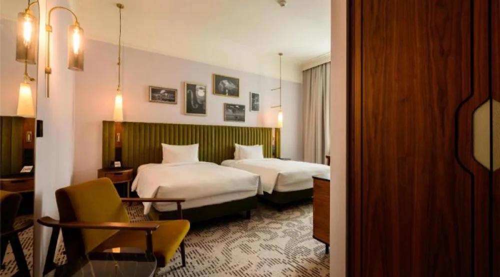 Two Double Beds Deluxe Courtyard Room at Hotel Saski Krakow Curio Collection by Hilton