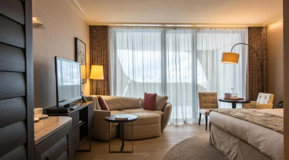 One King Bed Premium with Balcony at AlpenGold Hotel