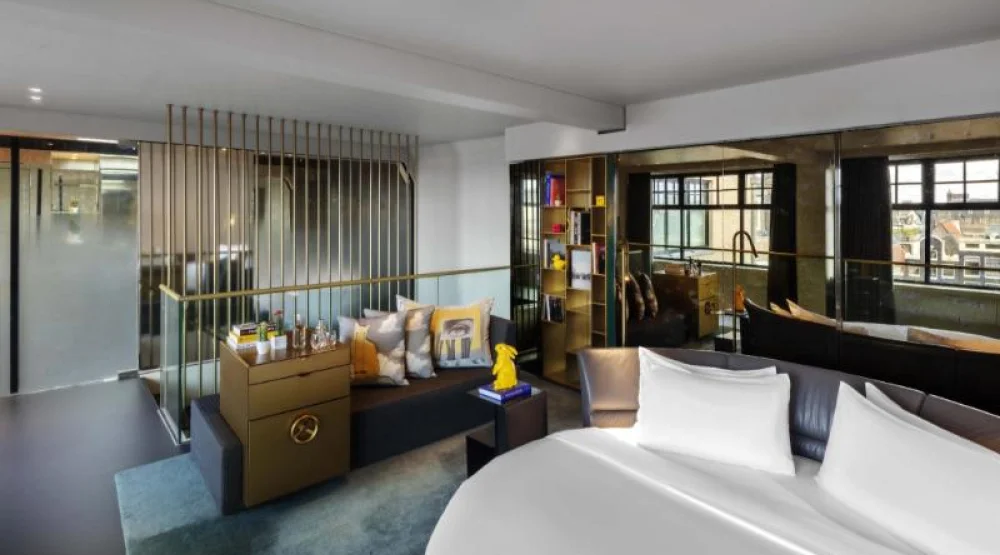 Penthouse I Bank, One Bedroom Bi-level Suite, in Loft: One King, Canal View, Fireplace at W Amsterdam