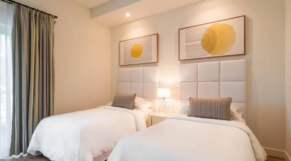 Panoramic Suite, Two Bedroom Suite, Bedroom 1: One Queen, Bedroom 2: Two Twin, Sofa Bed, Garden View at Sheraton Cascais Resort