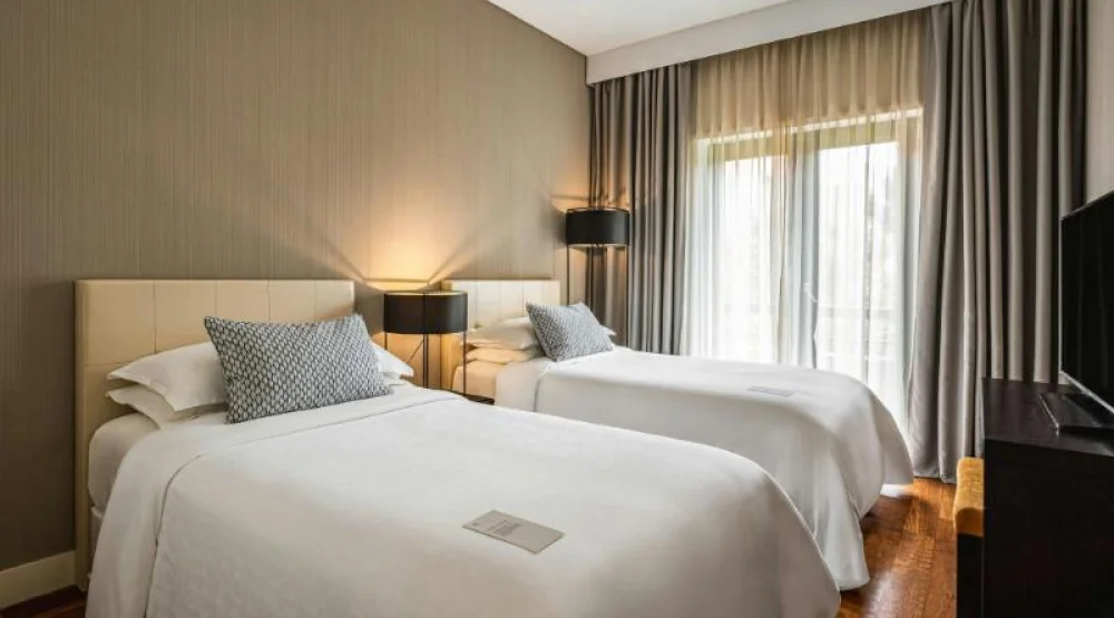 Three Bedroom Residence, Bedroom 1: One Queen, Bedroom 2: Queen, Bedroom 3: Two Twin, Garden View at Sheraton Cascais Resort