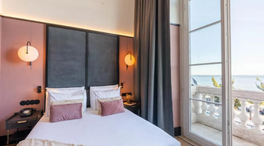 River View Room with Balcony at The Editory Riverside Santa Apolonia