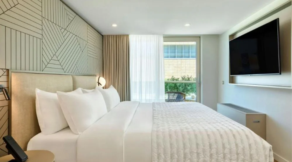 Three Bedroom Family Suite, Bedroom 1: One King, Bedroom 2: One King, Bedroom 3: One Twin Bunk, Balcony at Le Meridien Lav