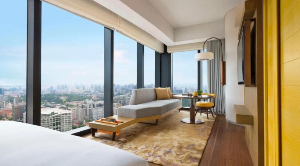 One King Bed Corner City View, Deluxe at Andaz Singapore