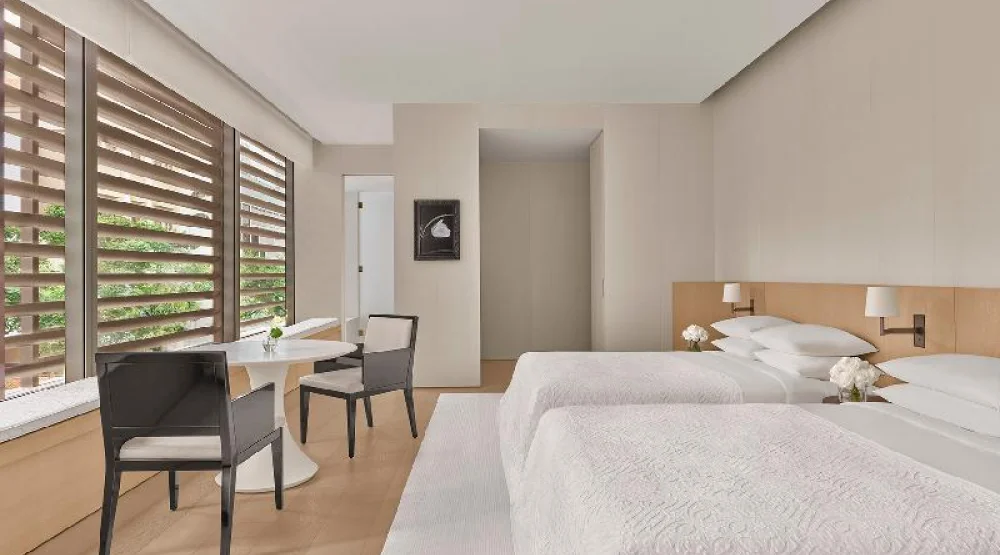 Deluxe Double, Larger Guest Room, Two Double, City View at The Singapore EDITION