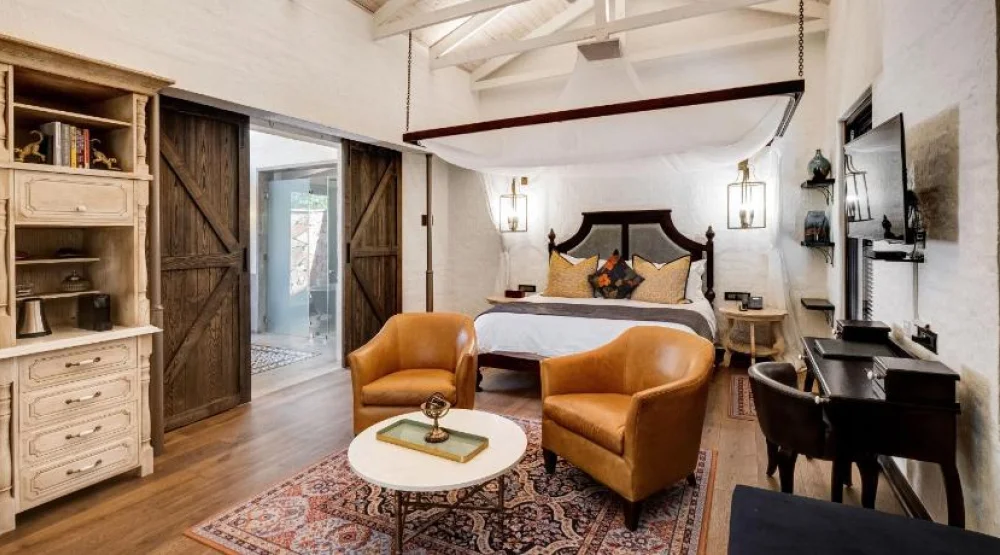 Deluxe King Room with Veranda and Forest View at Mbano Manor Hotel Victoria Falls