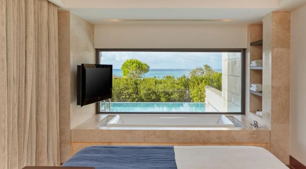 Premium Grand Infinity, One Bedroom Suite, One King, Alternate: Sofa Bed, Sea View, Private Pool at The Romanos, a Luxury Collection Resort