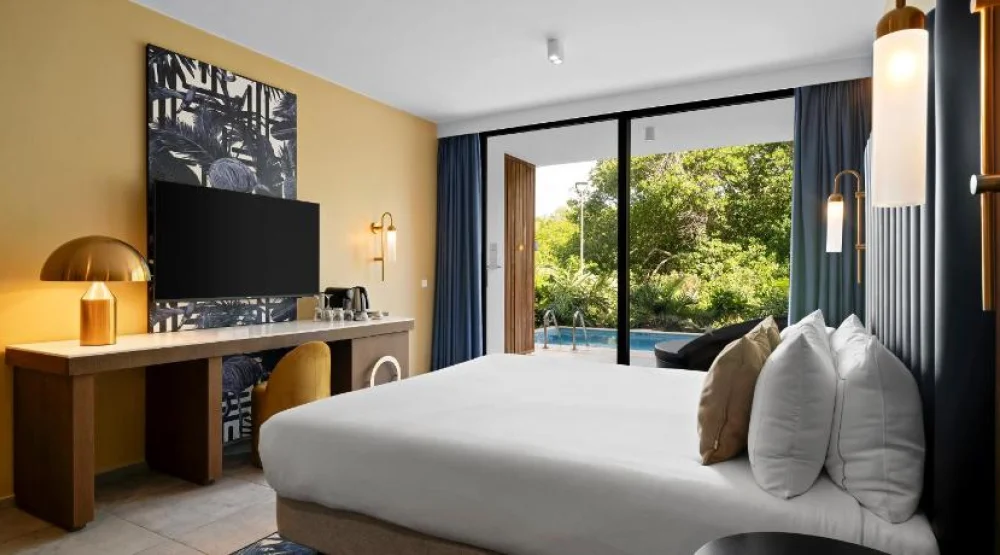 One King Bed Deluxe Swim Up Room - Adults Only at The Rif at Mangrove Beach Corendon Curacao