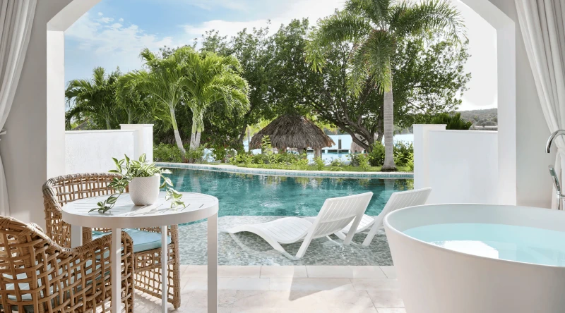 Sunchi Beachfront Swim-up Club Level Junior Suite W/ Patio Tranquility Soaking Tub at Sandals Royal Curacao