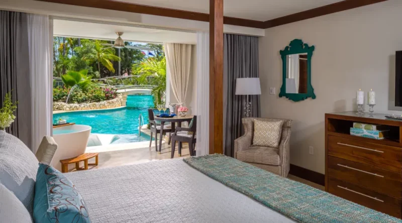 Crystal Lagoon Swim-up Club Level Luxury Room with Patio Tranquility Soaking Tub at Sandals Barbados