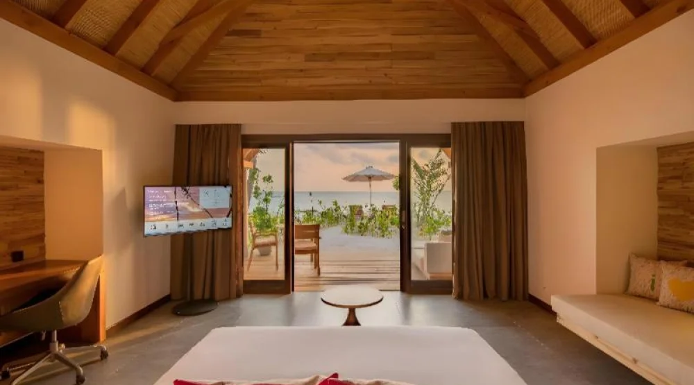 Beach Villa Sunrise (3 Adults) at Fushifaru Maldives
