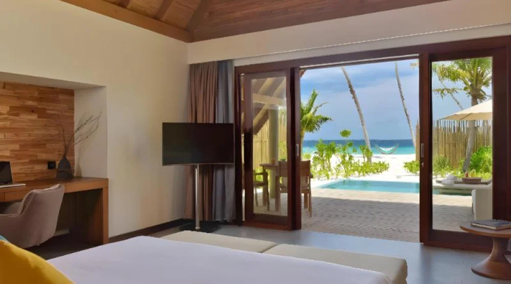 Pool Beach Villa Sunset (3 Adults) at Fushifaru Maldives