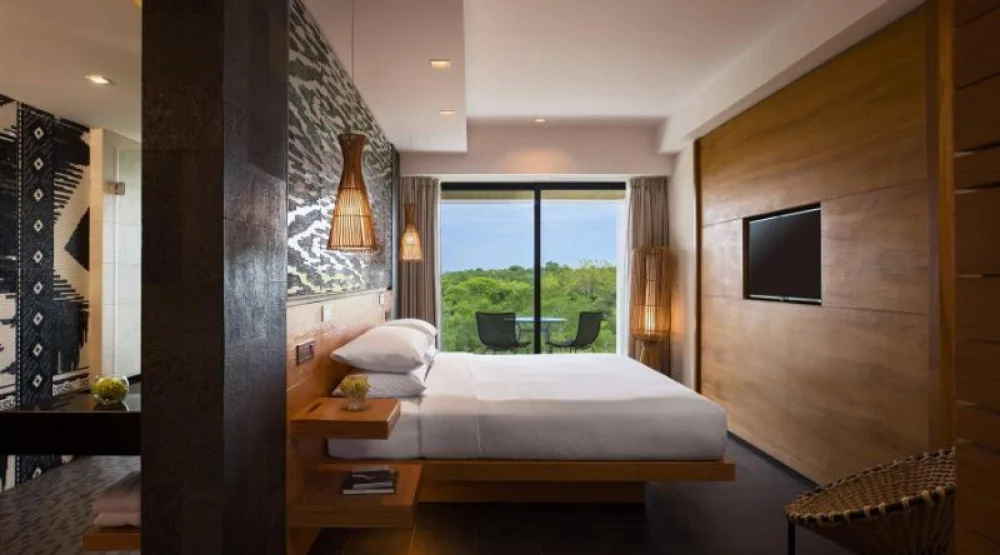 Guest Room, One King, Garden View, Balcony at Renaissance Bali Uluwatu Resort & Spa