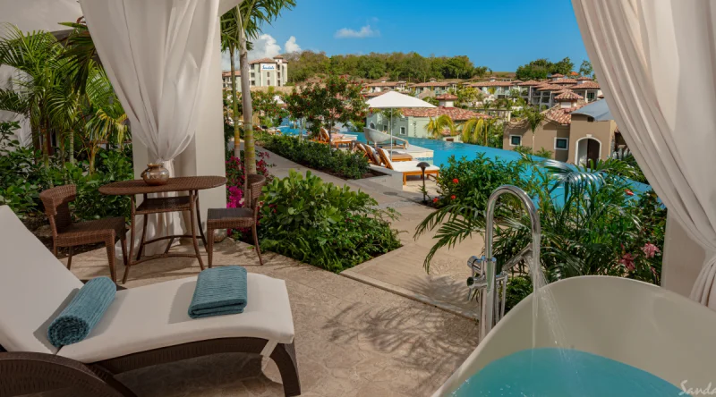 South Seas Honeymoon Poolside Hideaway Walkout Junior Suite with Patio Tranquility Soaking Tub at Sandals Grenada