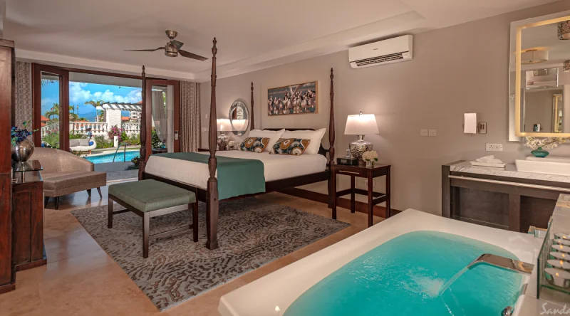 South Seas Waterfall River Pool Walkout Junior Suite with Patio Tranquility Soaking Tub at Sandals Grenada