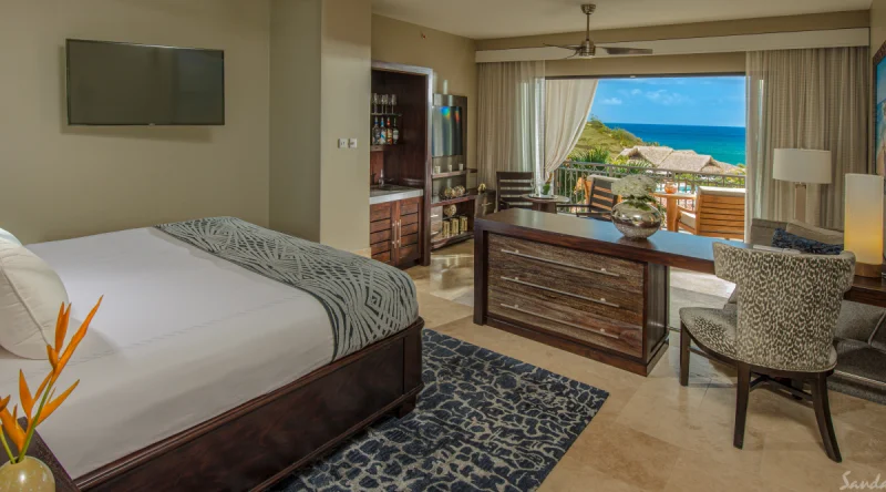 Italian Bi-level One Bedroom Butler Suite with Balcony Tranquility Soaking Tub at Sandals Grenada
