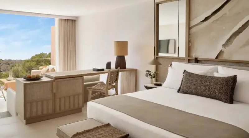 Deluxe Junior Suite Garden View at Ikos Porto Petro