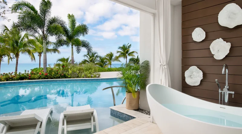 Starlight Beachfront One Bedroom Swim Up Butler Suite W/ Patio Tranquility Soaking Tub at Sandals South Coast