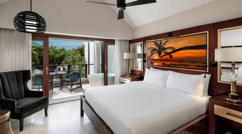 Longshore Beachfront Two Story One Bedroom Butler Villa Suite W/ Tranquility Soaking Tub at Sandals Negril